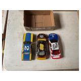 3 die cast racing cars