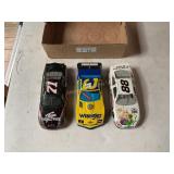 3 Die cast metal racing cars