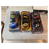 3 Die cast metal racing cars