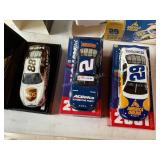 3 Die cast racing cars