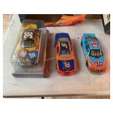 3 Die cast racing cars