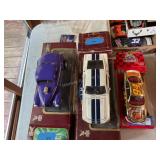 3 Die cast cars