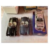 3 Die cast cars