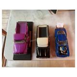 3 Die cast cars