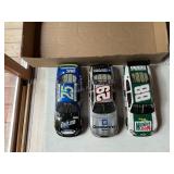 3 Die cast metal racing cars