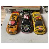 3 Die cast metal racing cars
