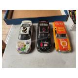3 Die cast metal racing cars
