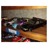 3 die cast cars