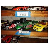 3 die cast cars