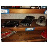 3 die cast cars