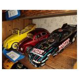 3 die cast cars