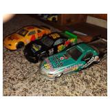 3 die cast cars