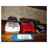 3 die cast cars