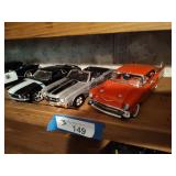 3 die cast cars