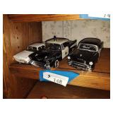3 die cast cars