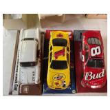 3 Die cast metal racing cars
