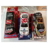 3 Die cast racing cars