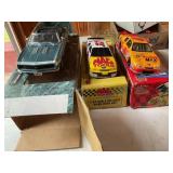 3 Die cast racing cars