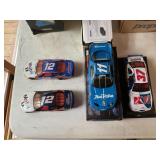 4 Die cast racing cars