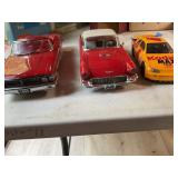 3 Die cast cars