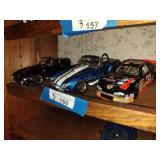 3 die cast cars
