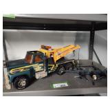 Nylint tow truck and model airplane