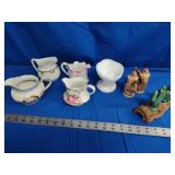 Salt and pepper shakers and cups