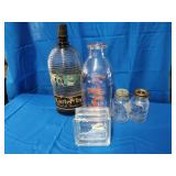Coin banks, milk bottle and ink bottle