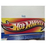 Hit Wheels plastic sign - damaged
