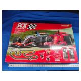 SCX Compact F1 slot car set