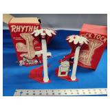 2 toy sand shovels Tick Tock and Rhythm
