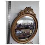 Curved round mirror