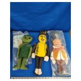 3 stuffed dolls