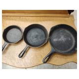 3 cast iron pans