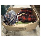 Box of fabric and wool clothes