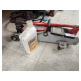 Floor jack and partial jack oil