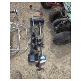 Trolling motor, ice auger and fishing buddy
