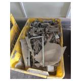 Assorted hangers and metal holding brackets