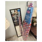 Ironing board and wall mirror