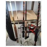 4 fishing rods - 3 with reels