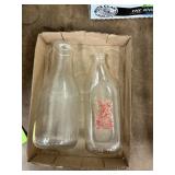 2 glass bottles - one marked Portage Coop milk