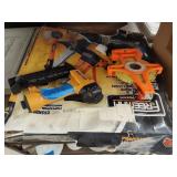 2 air nailers and measuring tape