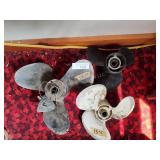 3 boat propellers