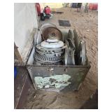 Assorted vintage hubcaps  and crate