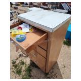 Draw cabinet with yard items