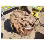 Basket of burlap sacks