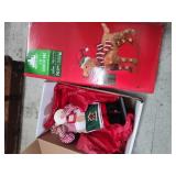 Santa figure and lighted dog