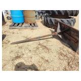 Hay spear skid steer attachment