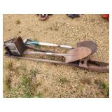 Shovel, birdhouse and post hole digger