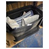 Tote of rugs and other items